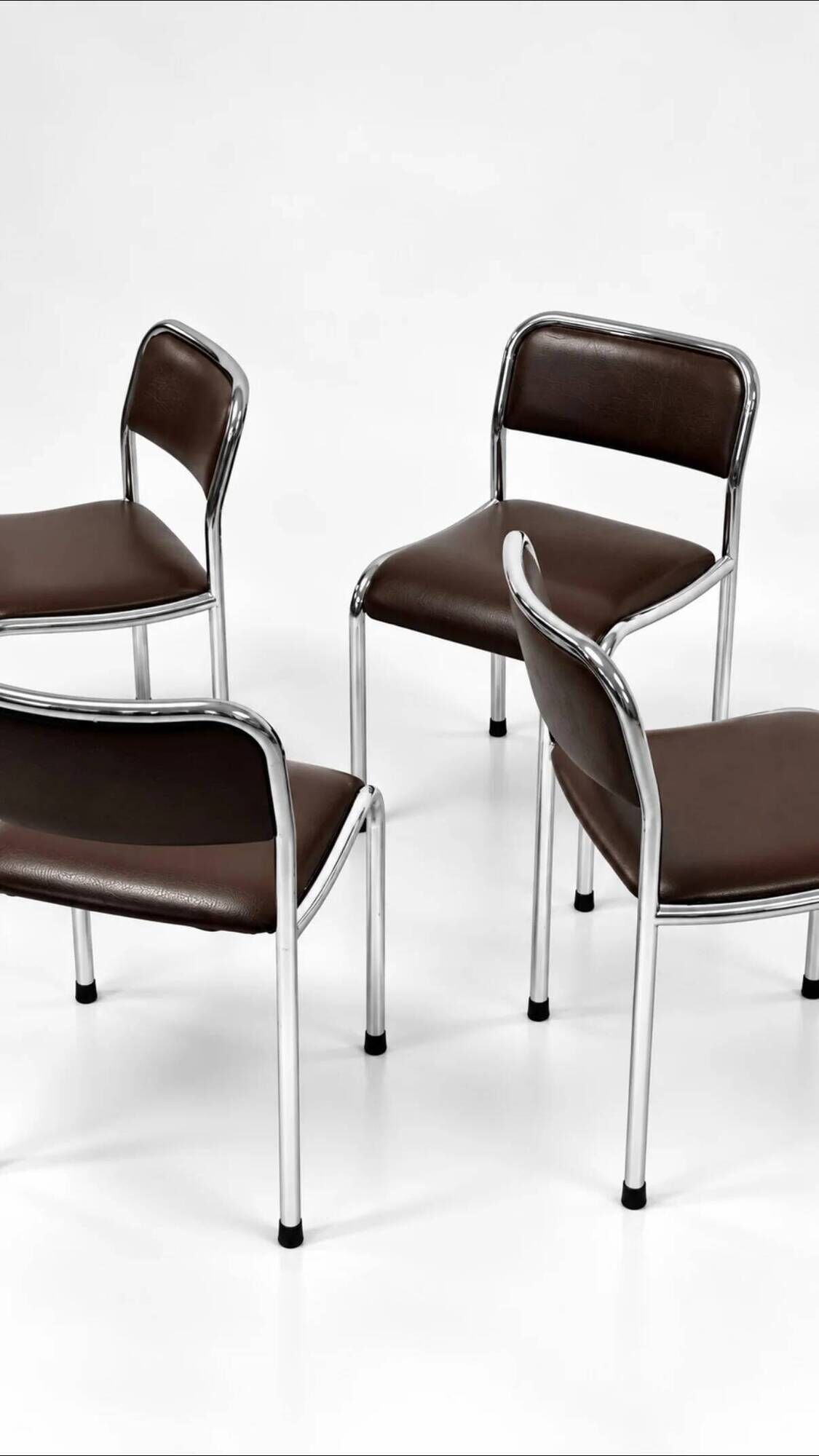 Set of 4 vintage dining chairs in chrome, brown faux leather, 1970s.