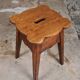 Pair of scalloped oak stools, France, early 20th century