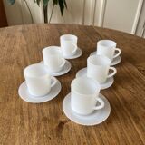 Espresso coffee cup service, Nestlé promotional items, in white glass.