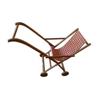 Old foldable wooden stroller toy