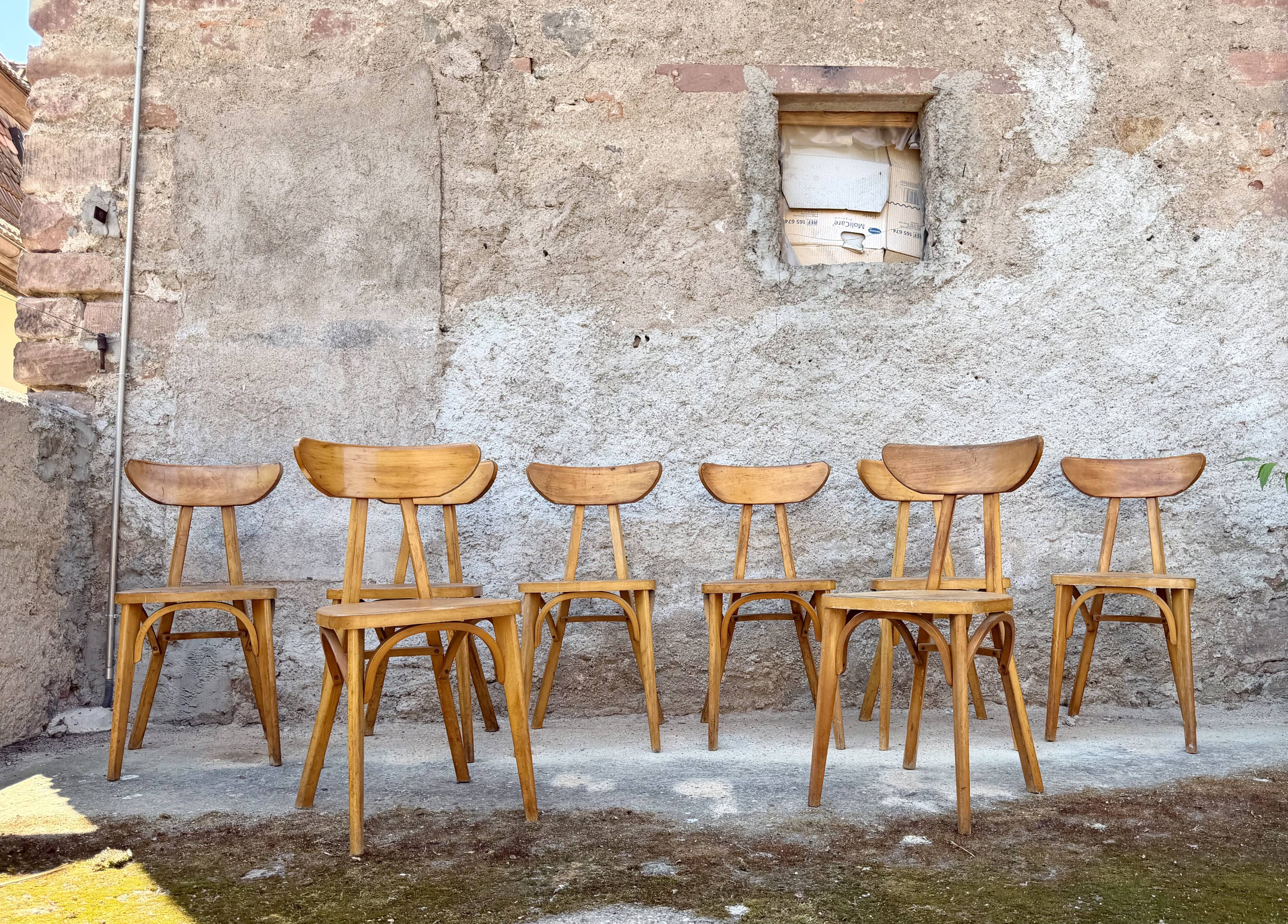 Série de 9 chaises bistrot lutherma banane boomerang