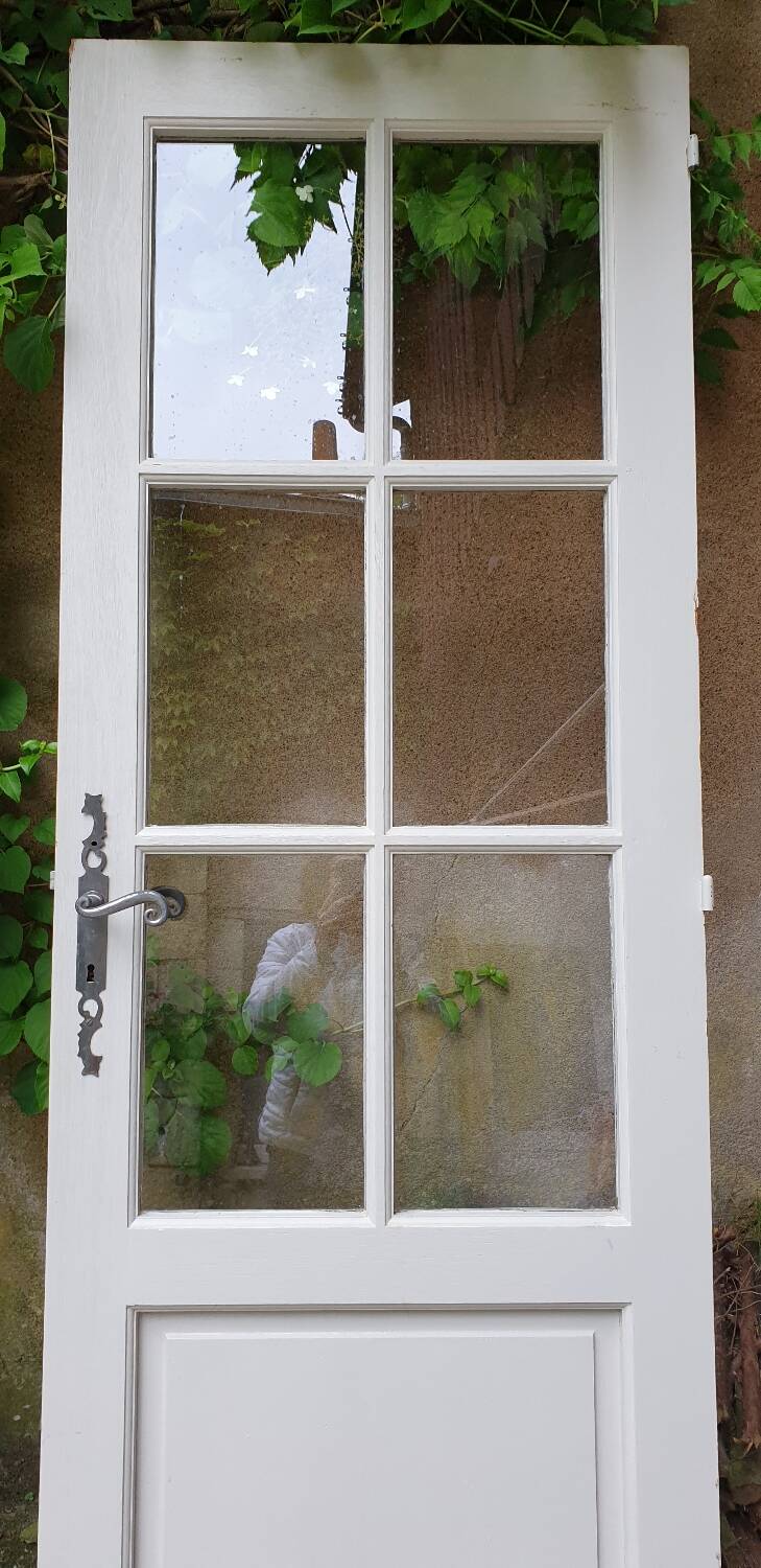 Old wooden door with small squares