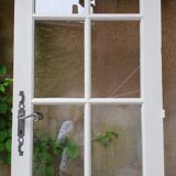 Old wooden door with small squares