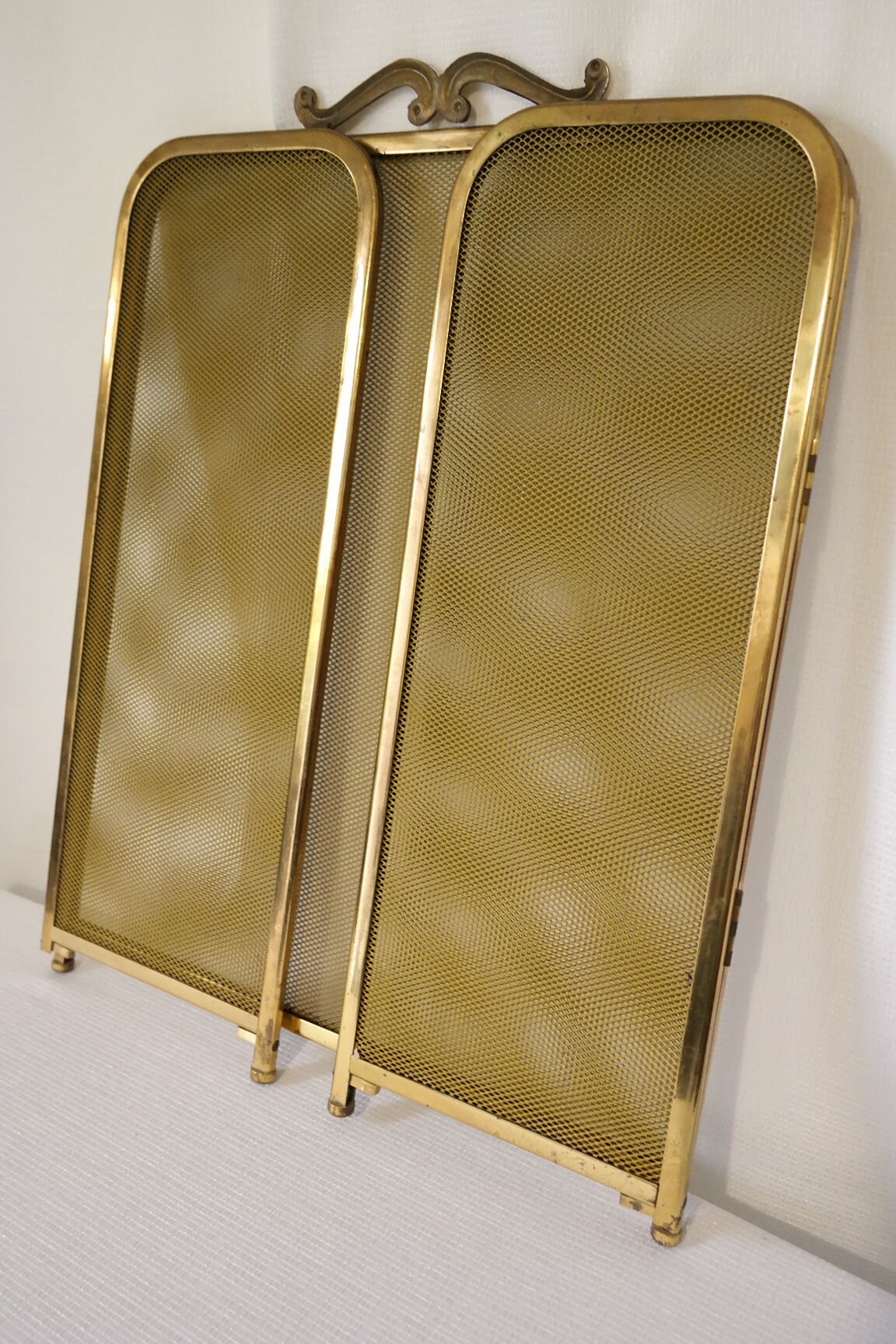 Vintage brass chimney firewall