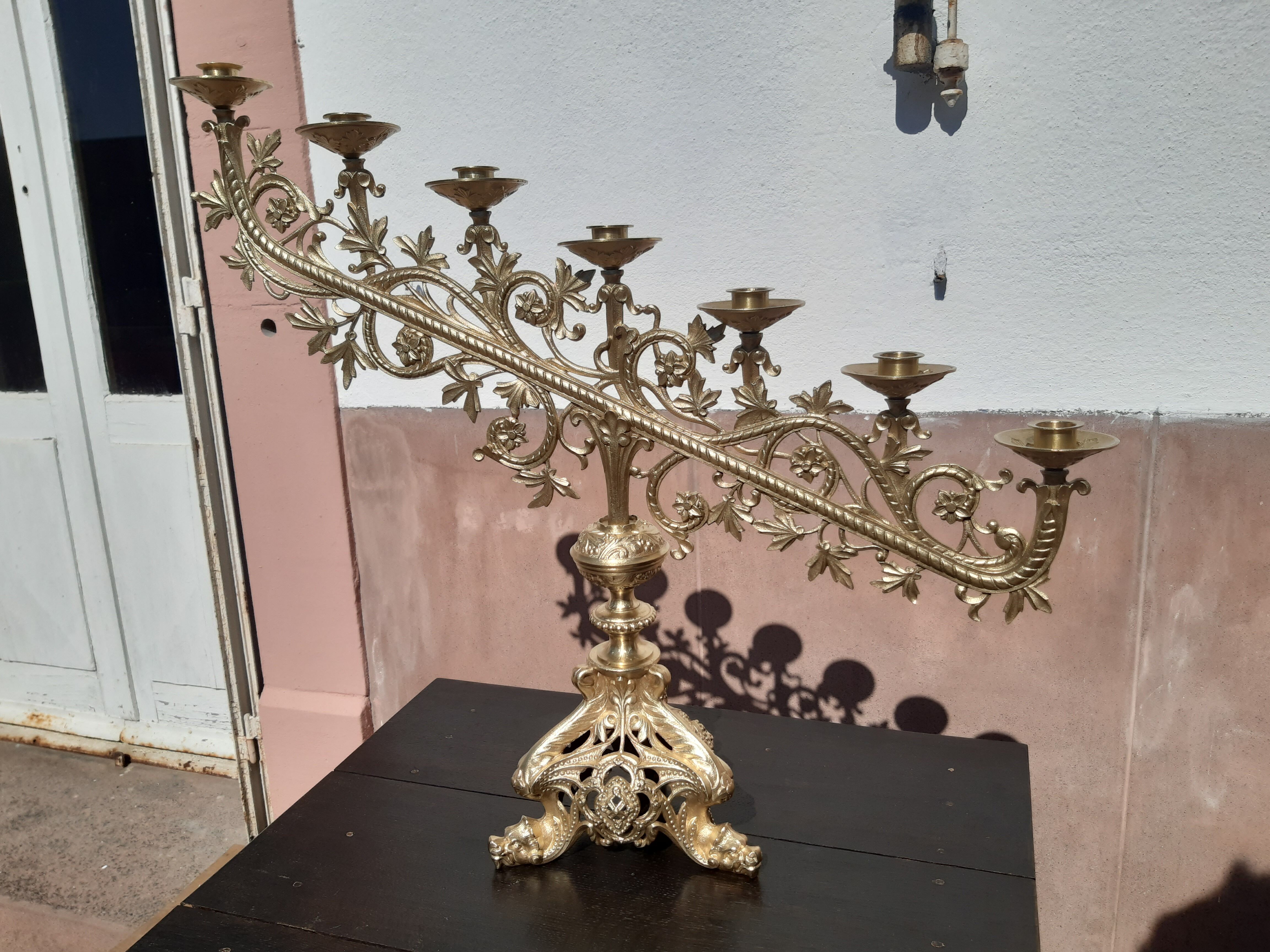 Antique candle holder in bronze and brass nineteenth century.