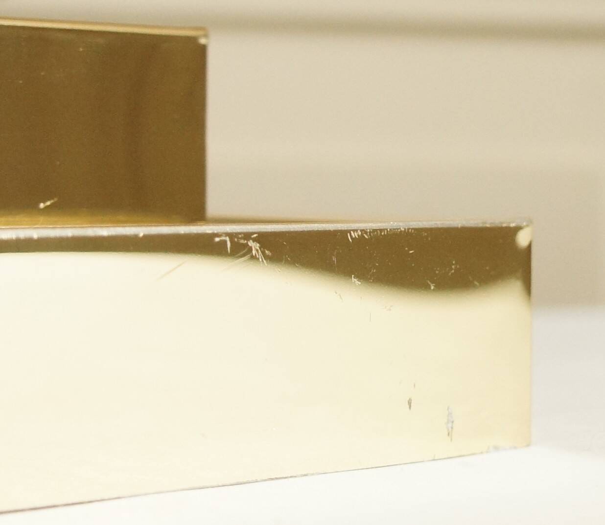 Hollywood Regency articulated lamp/wall lamp in golden brass