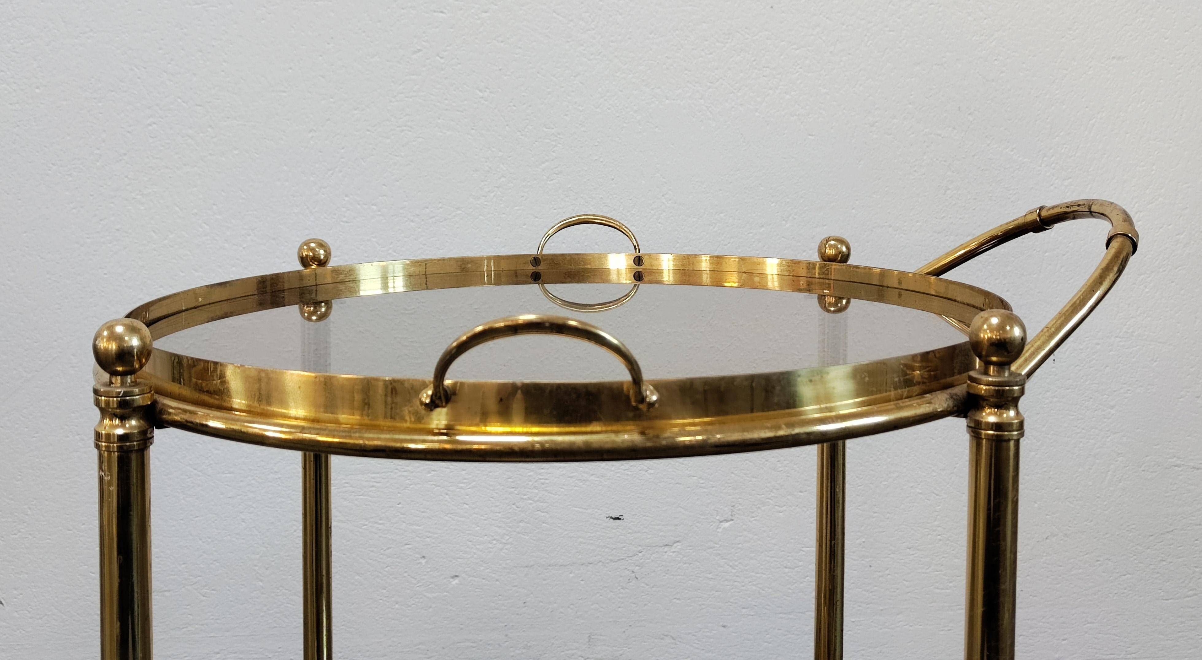 Hollywood Regency bar cart in bronze and smoked glass, 1950s