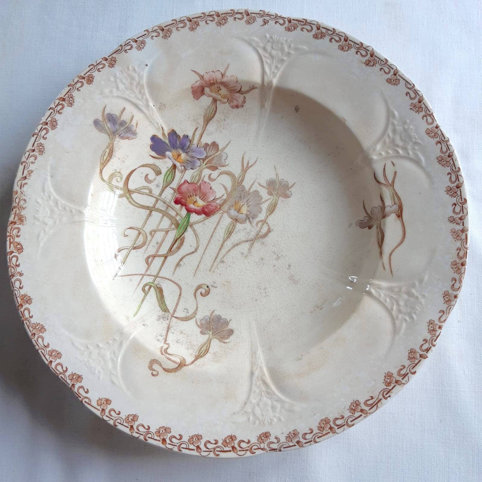 Set of 7 nielles model plates in longwy earthenware, art nouveau, circa 1900