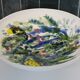 Decorated white earthenware fruit bowl