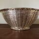 Braided silver metal basket