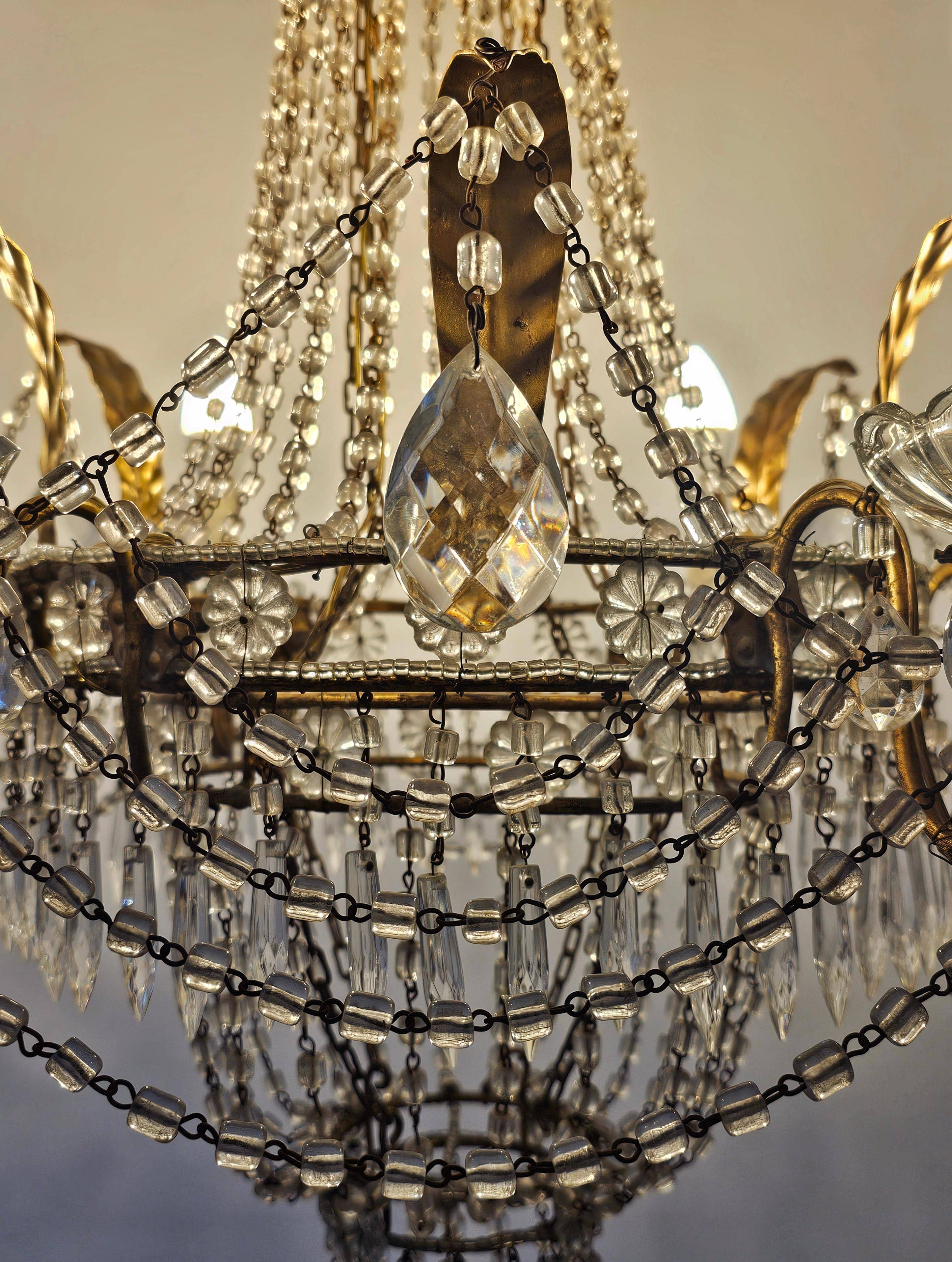Antique crystal chandelier with floral details 1910