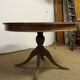 Empire style round table "Lion's Paws"
