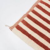 A handmade Moroccan striped terracotta rug, 150/250cm
