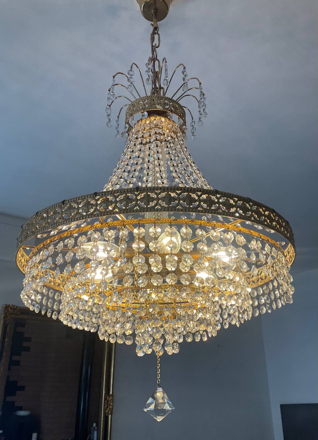 Brass hot air balloon chandelier with cascade of tassels