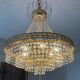 Brass hot air balloon chandelier with cascade of tassels