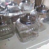 three large glass jars