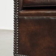 luxury dark leather club chair with English-style ball feet