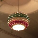 Handmade suspension in coloured woven natural plant fibres.