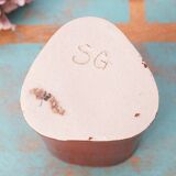Vase with triangular section in sandstone signed
