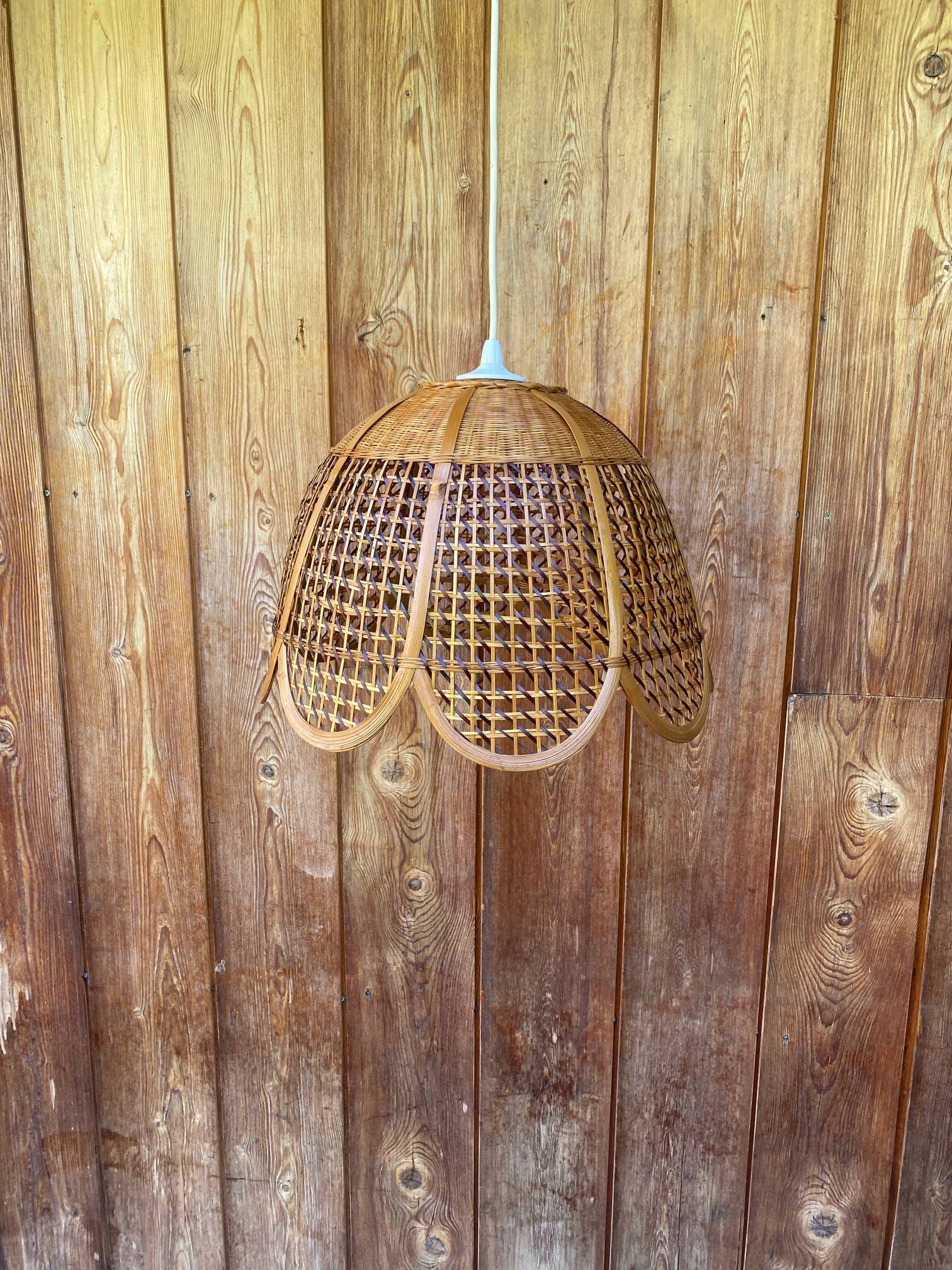 Rattan and cane lampshade in the shape of a flower from the 1970s.