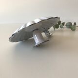 Candlestick in white enameled metal