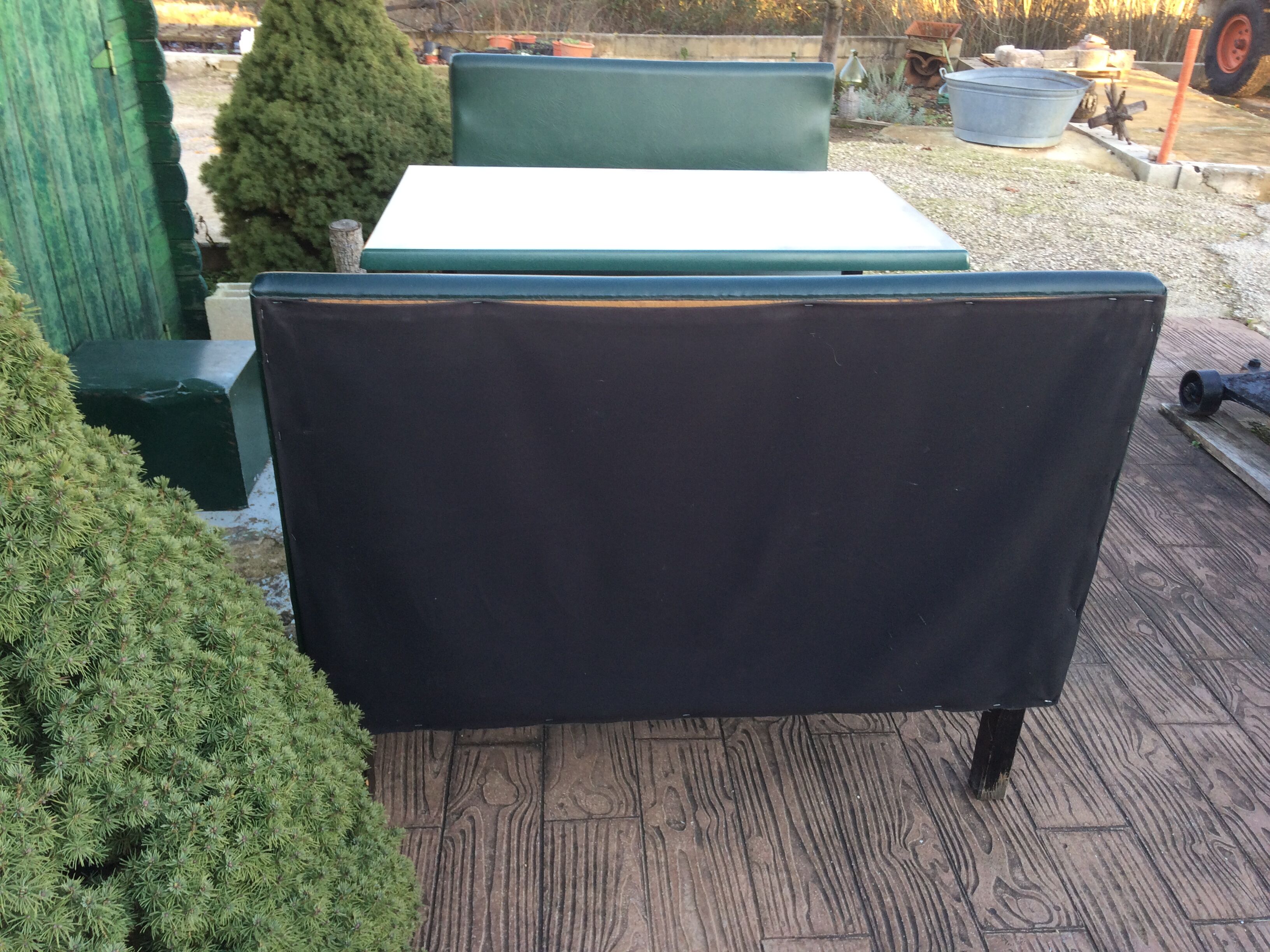 Set of two bistro banquettes plus table