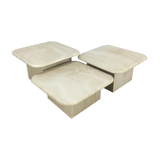 Three travertine trundle coffee tables