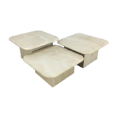 Three travertine trundle coffee tables