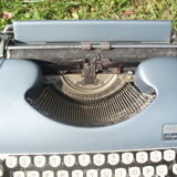 Typewriter blue japy script  with manual and carrying case