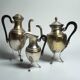 Set of three silver-plated tripod jugs, Empire, late 19th century