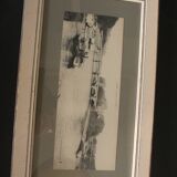 Frame with old postcard from Paris