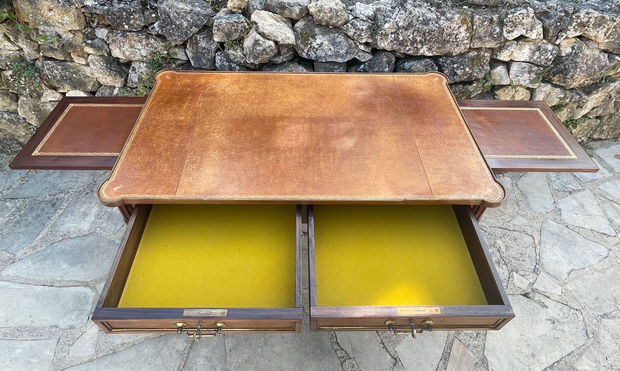 Louis XVI style mahogany flat desk from the late 19th century