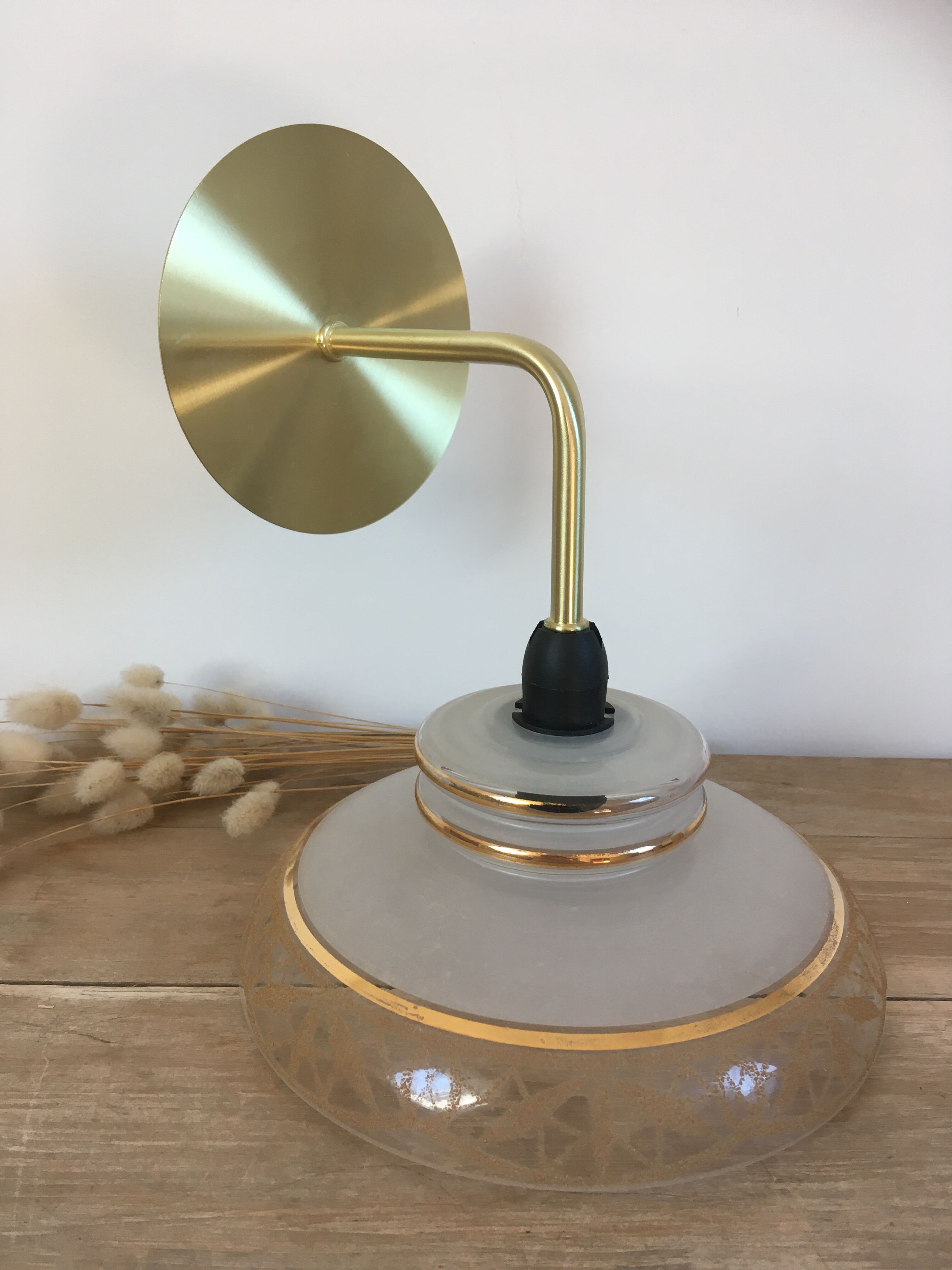 Vintage globe wall lamp in glass and brass base