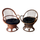 Pair of rotating rattan armchairs