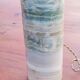 Designer lamp from the 70s in almond green onyx with original fabric shade