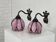 pair of iron wall lights and Tiffany style glass legs
