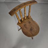 Old farmers tripod chair for decorative use