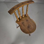 Old farmers tripod chair for decorative use
