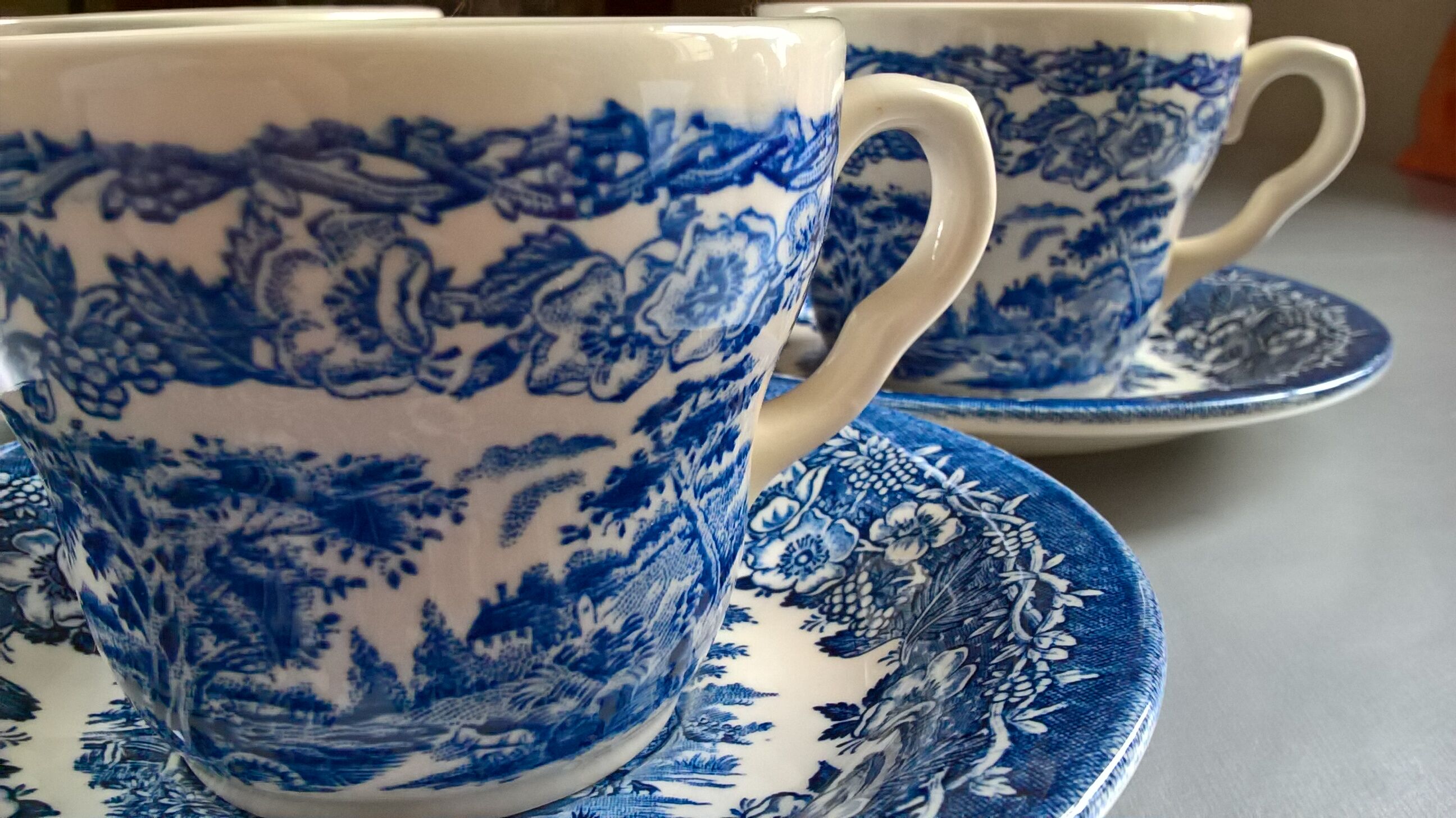 English Ironstone Tableware Ltd (EIT) "Kingswood" blue-white cups and saucers