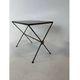 Modernist nesting tables in metal and black glass, 1950s.