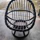 Swivel rattan love seat