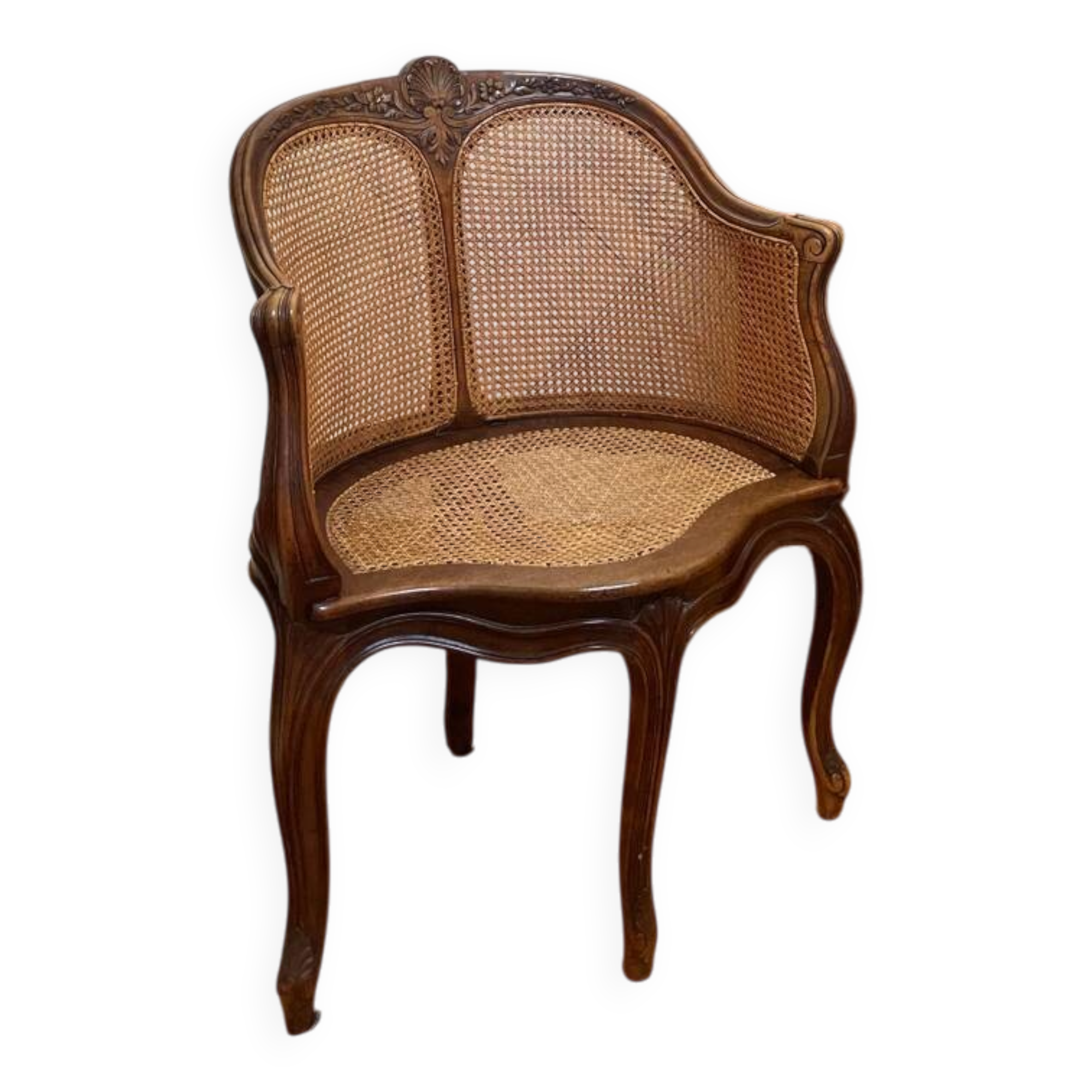 Cane seat armchair from the 19th century in the Louis XV style, known as "couillard".