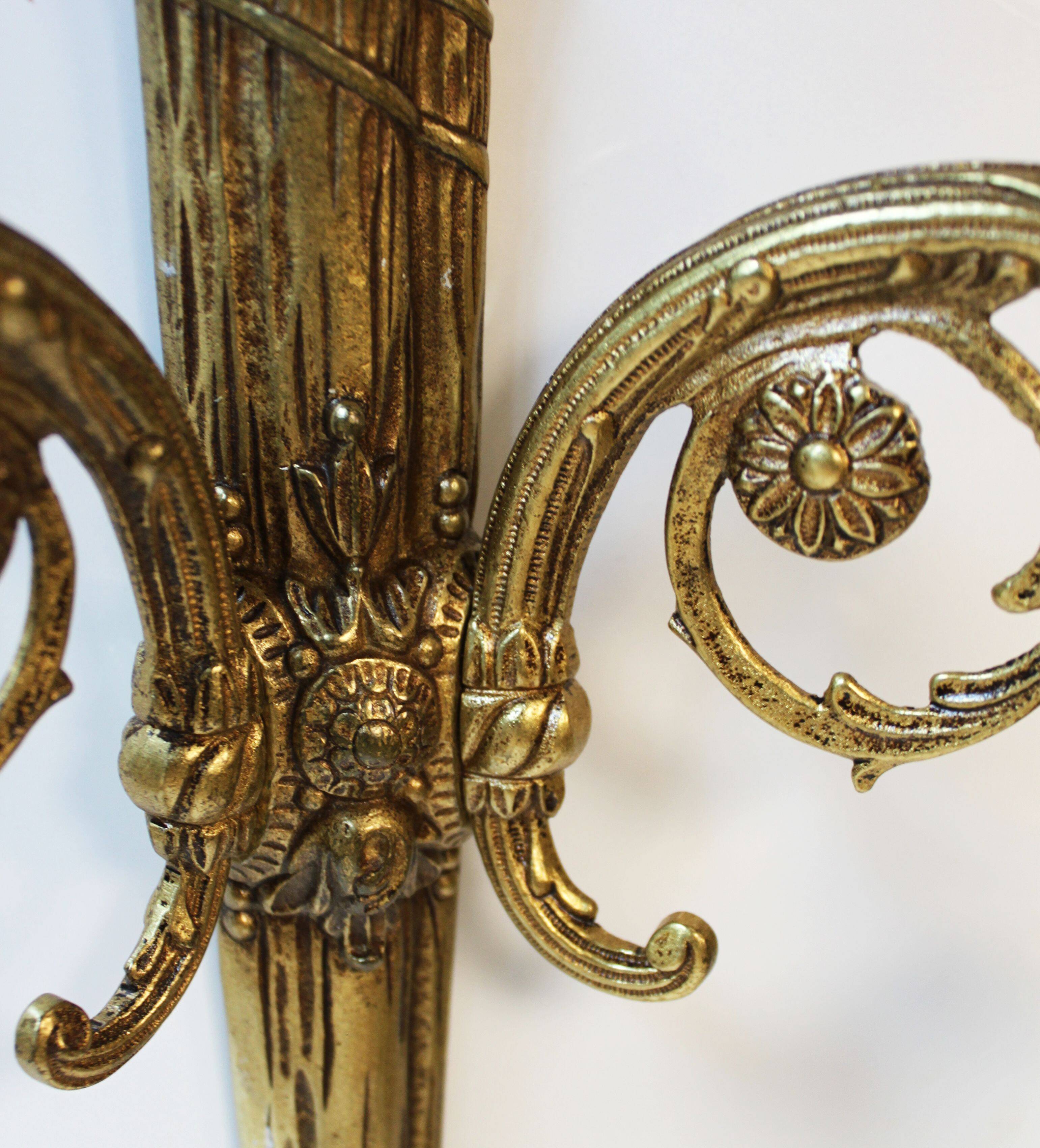 Pair of wall sconces in gilded bronze, Louis XVI style.