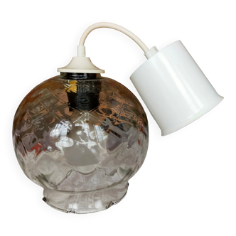 Pendant light with polished glass globe in checkerboard design