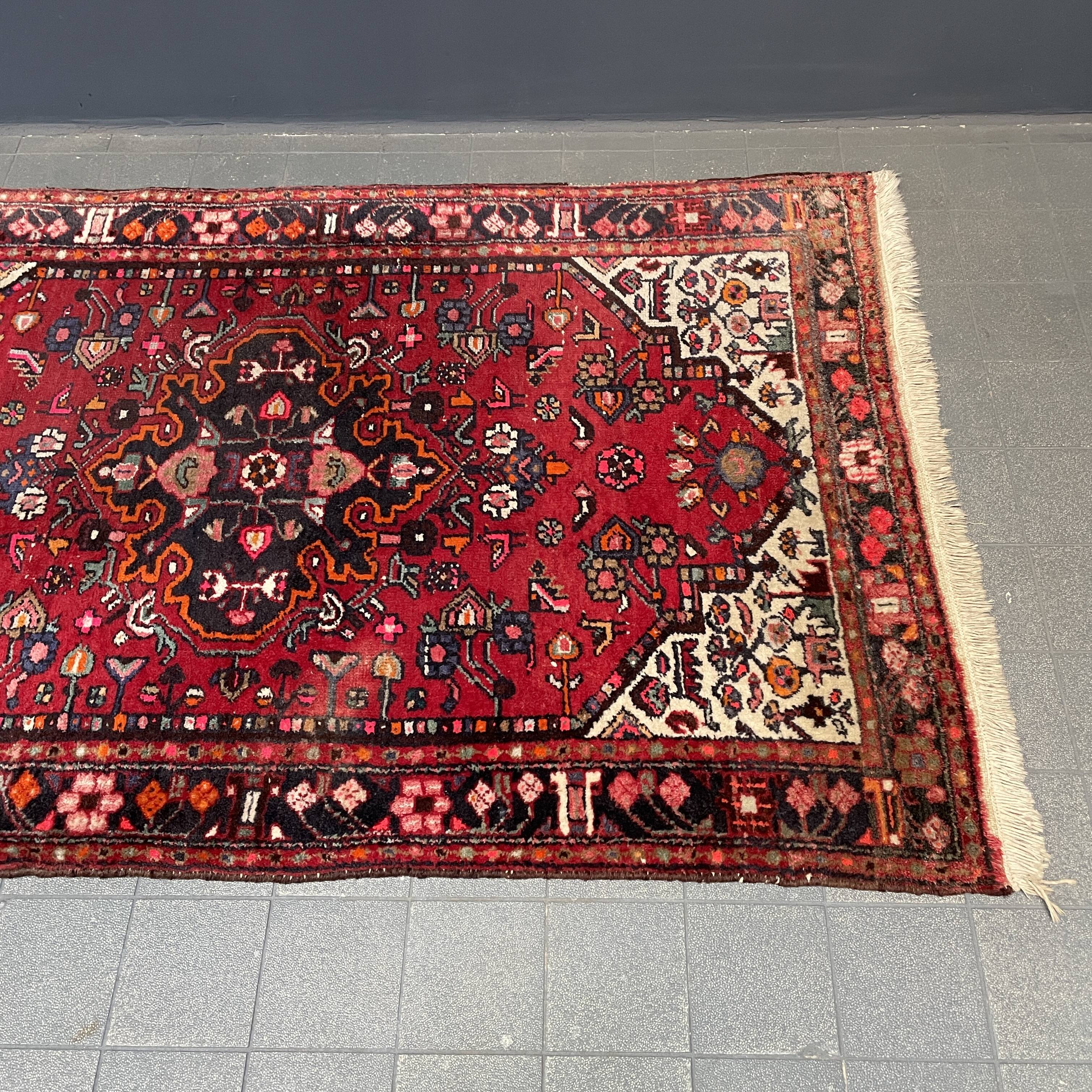 Worn vintage oriental rug or carpet