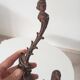 Antique wall coat hook from the 19th century in Victorian cast iron style.