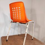Chair with openwork plastic shell 1970