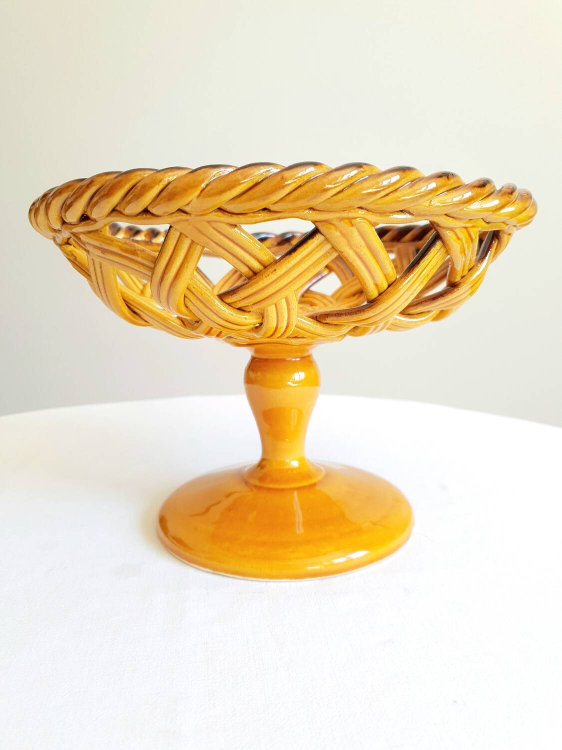 Braided bowl on ceramic base