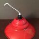 Industrial suspension in red metal