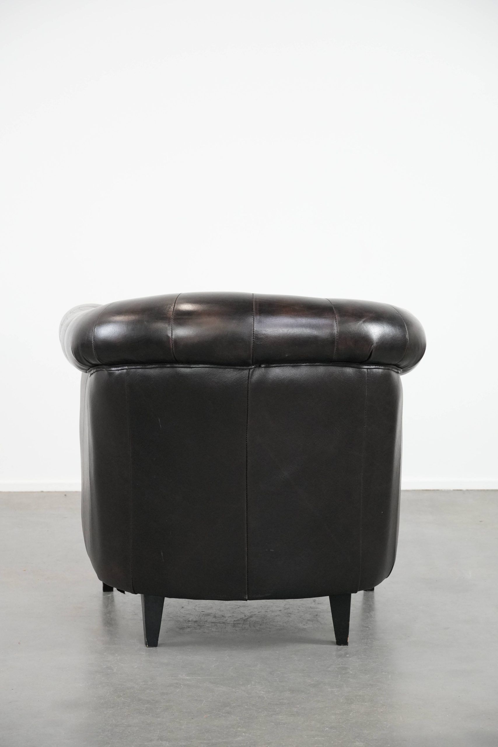 Dark luxury cowhide Chesterfield club armchair in English style